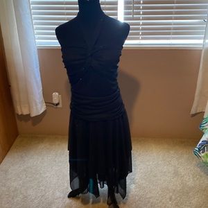 Black with silver sparkles. Beautiful worn once. Look really beautiful on.